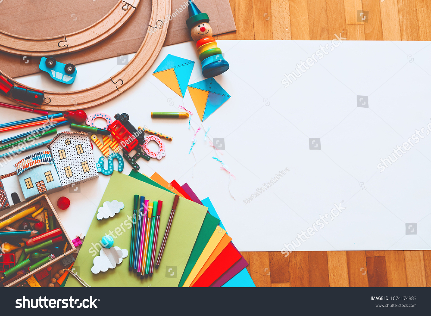 Background for preschool or kindergarten or art classes. Kids educational toys and school supplies for draw and make DIY crafts. Flat lay top view. Art child frame with empty paper mock up for text