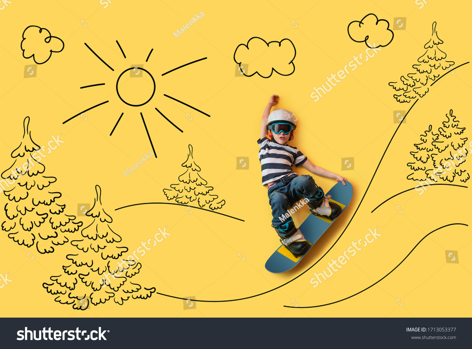 The little boy dreaming about winter season and snowboarding. Childhood and dream concept. Conceptual image with boy who conquers big mountains on a snowboard. Yellow background. Dream about sports.