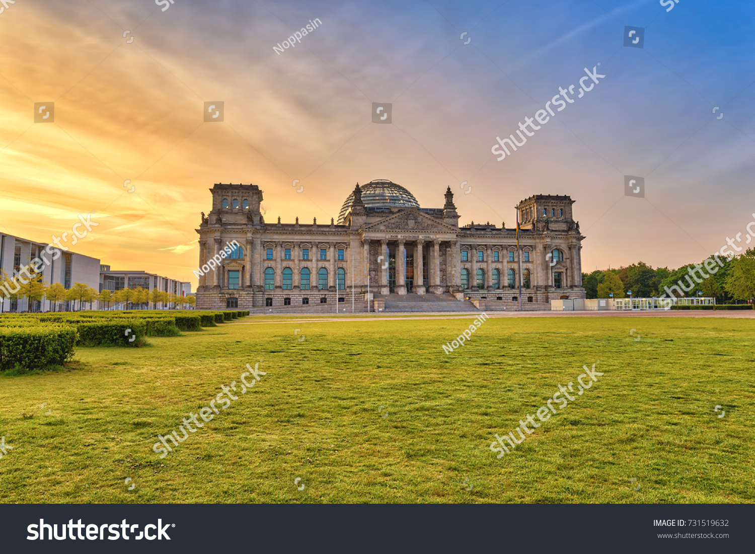 Berlin sunrise city skyline at Reichstag Berlin Germany (German Text = to German people)