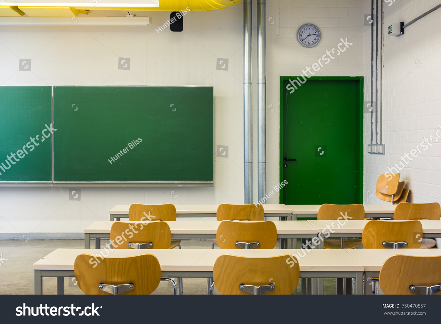 Empty Wooden Chairs at Tables Depth of Field Lecture Hall Nobody Green Chalkboard University Education College Higher