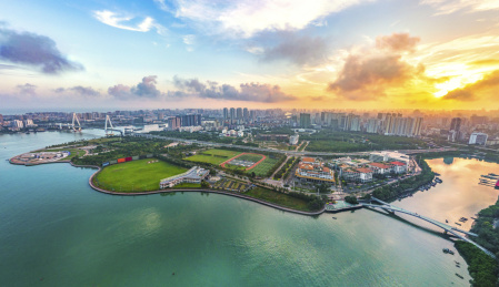Aerial View of Buildings and Parks in Binhai Central Business District and Parks of Haikou City in Hainan Island of China