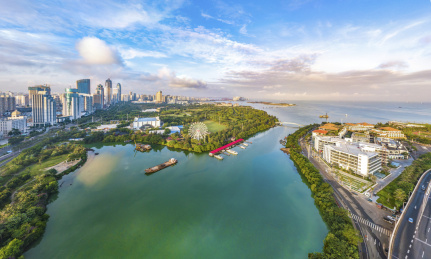 Aerial View of Buildings and Parks in Binhai Central Business District and Parks of Haikou City in Hainan Island of China