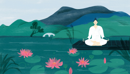 室外冥想打坐的白衣女性