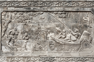 山西省平遥古城清代古民居马家大院内的灰砖墙砖雕