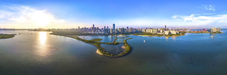 Panorama View. Haikou City Skyline with Office Buildings, Yacht Marina, Container Port and Public Parks. Hainan Province, China. 