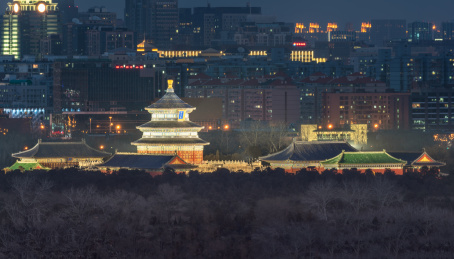 北京市天坛祈年殿及市区现代建筑远景夜景