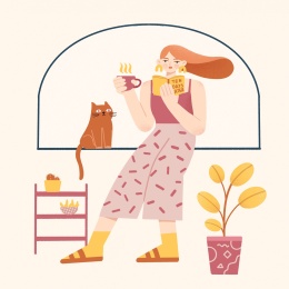 捧着杯子的阅读的女孩