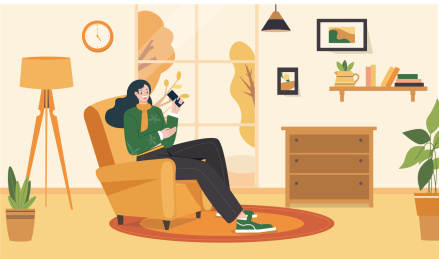 秋天女孩坐在沙发上玩手机