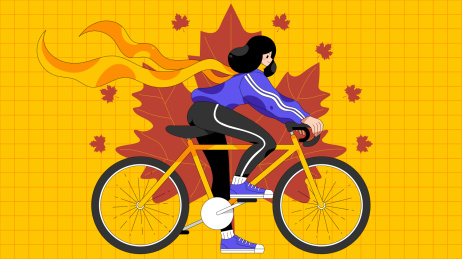 骑车的女孩和秋天的枫叶