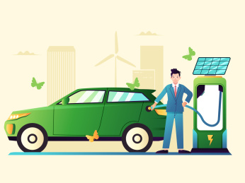 一个人在用充电桩给汽车充电