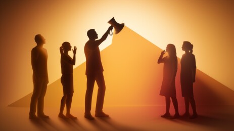 一个人对着人群用扩音器喊话的插图