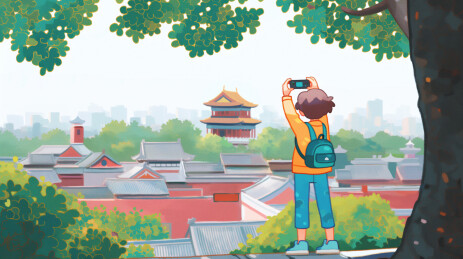 一个男生在给北京故宫拍照