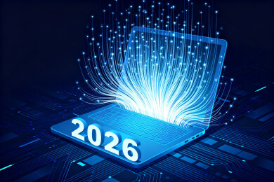 蓝色背景里的2026和笔记本电脑